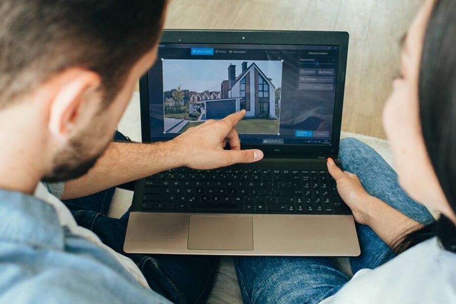 couple browsing online to buy their dream home