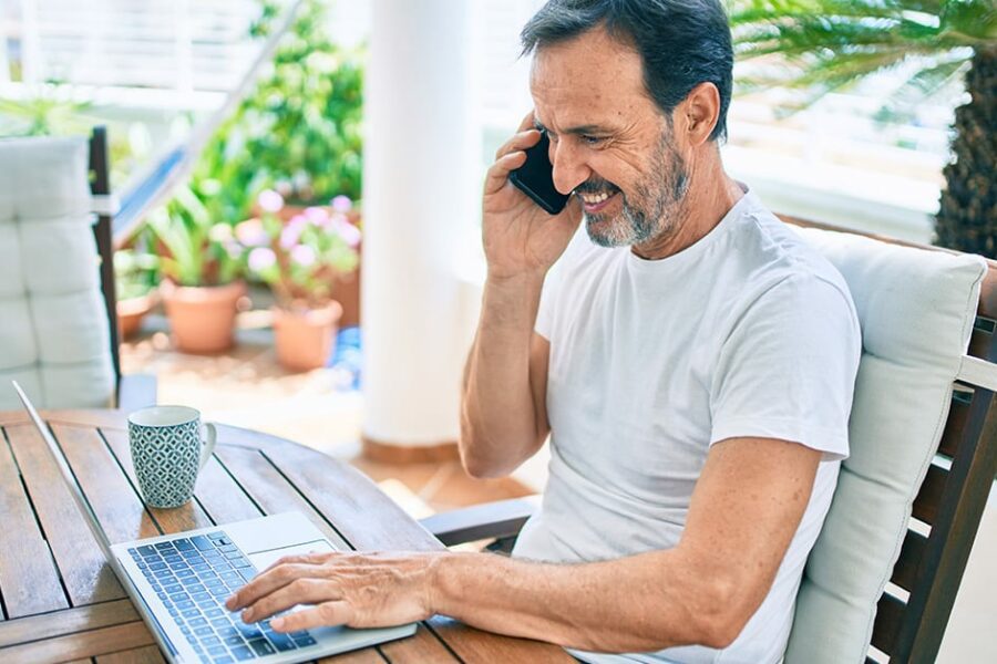 Senior man working from home as phase retirement program