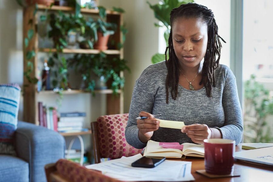 African american woman reviewing her finances