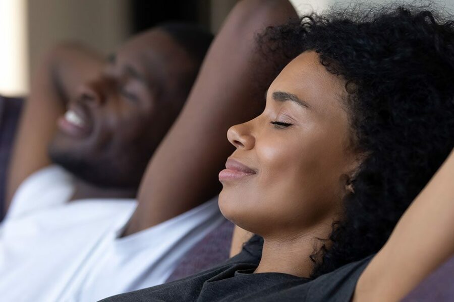 A woman and her partner free from financial stress