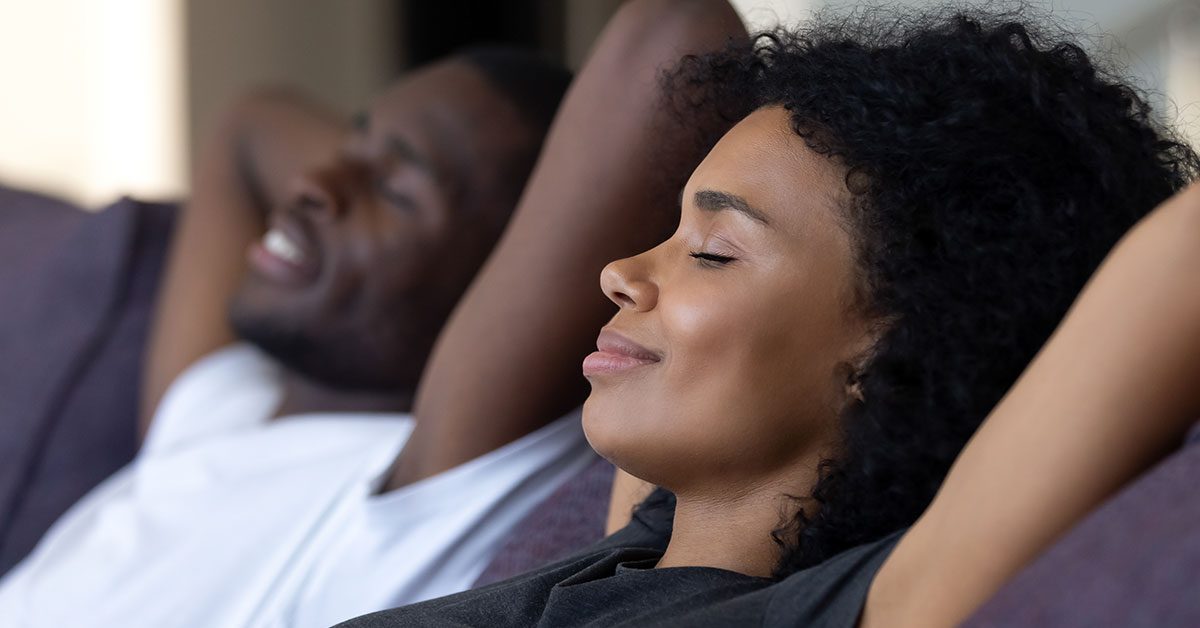 A woman and her partner free from financial stress