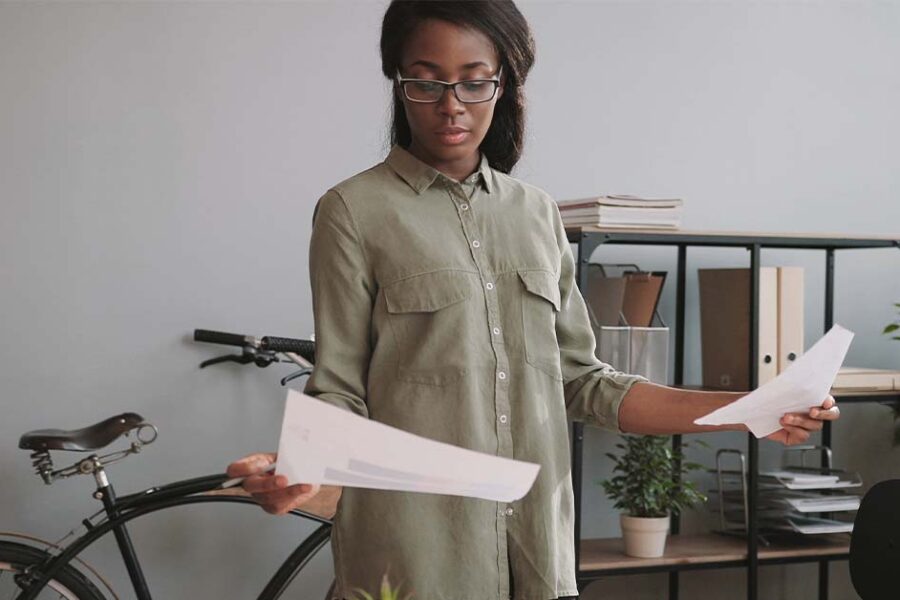 Woman comparing Life Insurance vs Health Insurance
