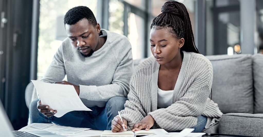 Couple looking at forms.