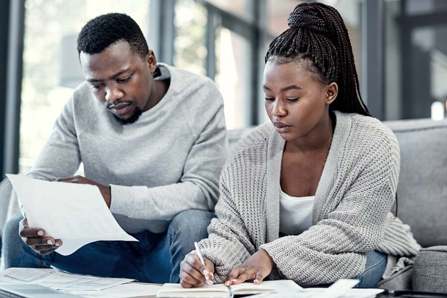 Couple looking at forms.